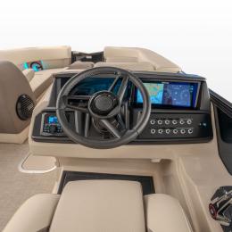 Interior helm area of Alera Model M 25L featuring a wide console, ergonomic controls, and modern styling.
