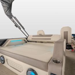 Rear lounge position on the Alera Model M 25L featuring the Roswell R1 Premium Audio Package with transom remote — effortless control, exceptional sound, and ultimate relaxation.