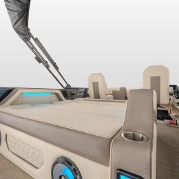 Full-bed lounger configuration on the Alera Model M 25L — transforms seamlessly for all-day comfort, sunbathing, or evening relaxation on the water.